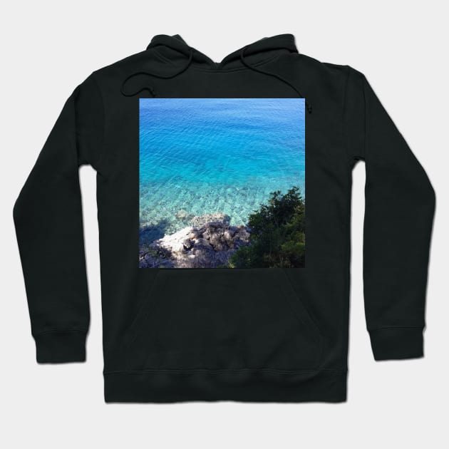 Clear Ocean Water Rocky Beach Photo Hoodie by OneLook